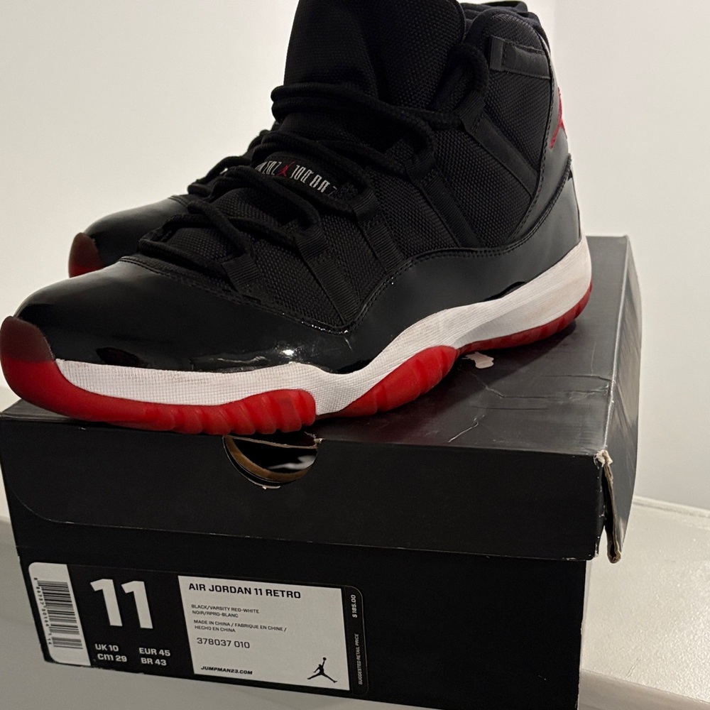 Jordan Air 11 Retro Black and Red Athletic Shoes